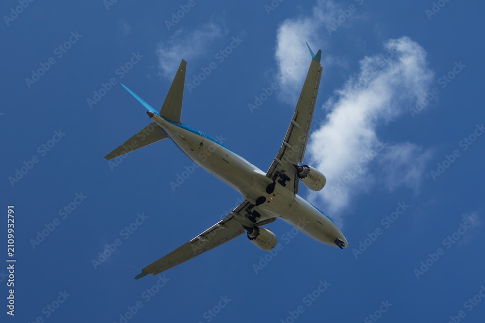 Fototapeta premium Bottom view of passenger airplane approaching Burgas airport
