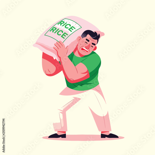 Man struggling to carry a large sack of grain