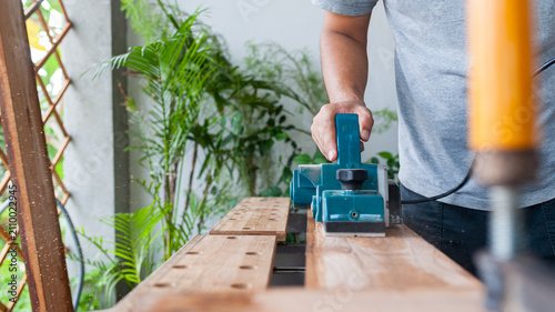 Carpentry timber modification equipment motor planer woodcraft construction hardware workshop renovation craftsmanship maintenance production precision mechanic project tool