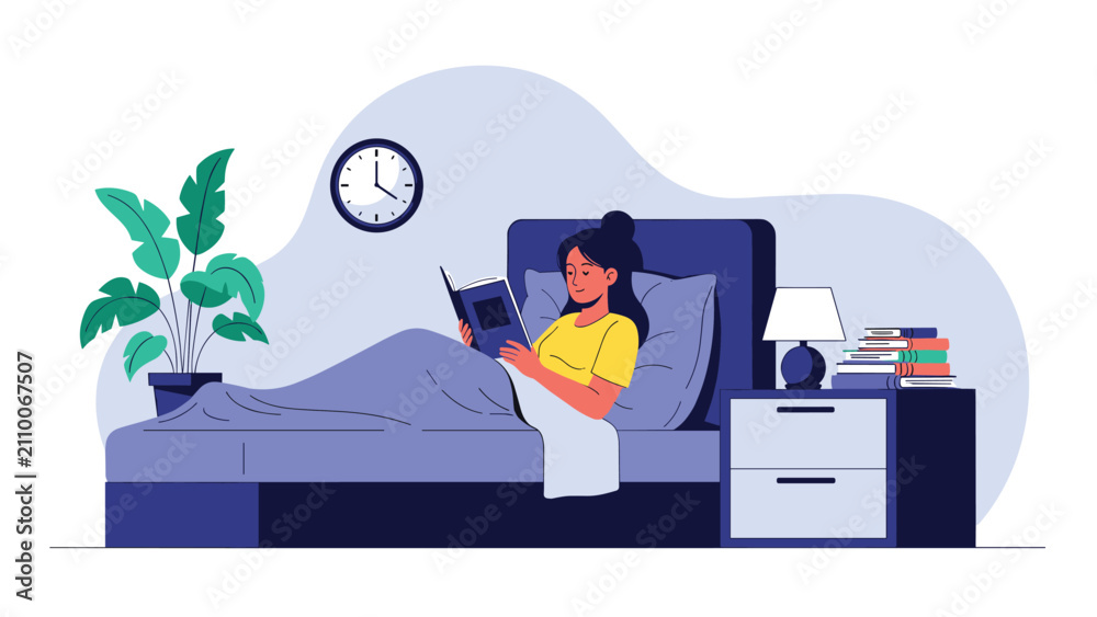 Obraz premium Young woman reading an interesting book in bed before falling asleep in a cozy dark bedroom during night time.