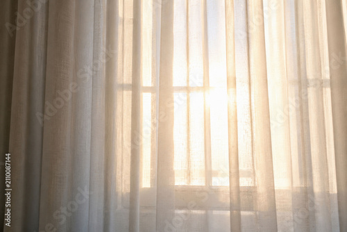 Foto Sunlight Through Sheer Curtains