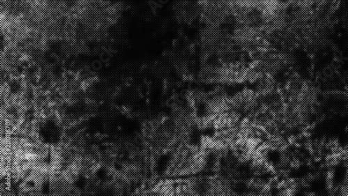 Foto Detailed black and white halftone pattern showing a mottled textured surface wit