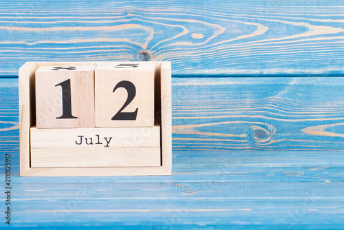 July 12th. Date of 12 July on wooden cube calendar