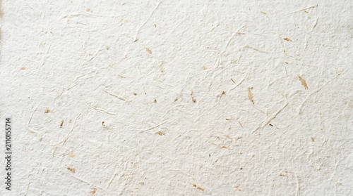 A textured off white plaster wall background with subtle organic imperfections and a soft neutral aesthetic