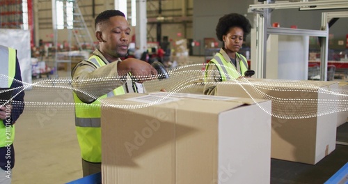 Warehouse packer packing box for orders as belt moving peer scanning waveform sweeping over boxes
