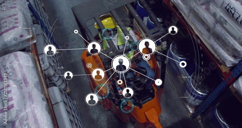 Forklift driver driving warehouse aisle, adjusting levers and activating network around operator