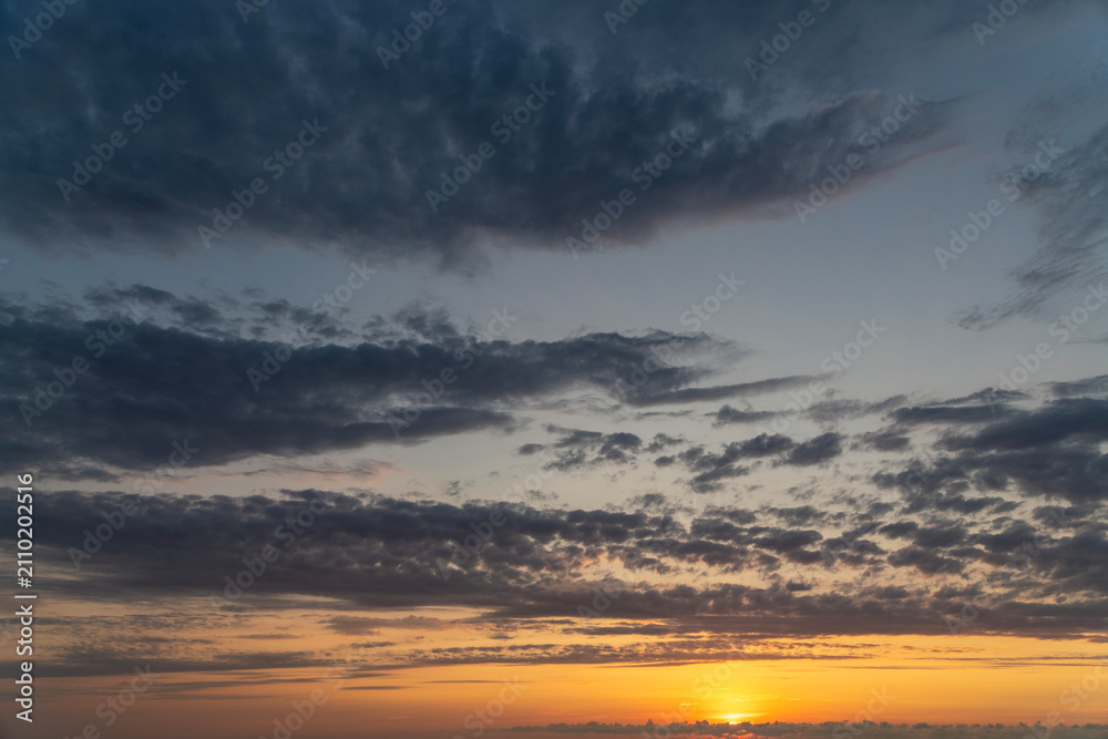 Fototapeta premium Beautiful summer sunset sky colorful clouds.