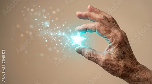 Elderly hand holding a magical glowing star representing senior achievement and legacy.