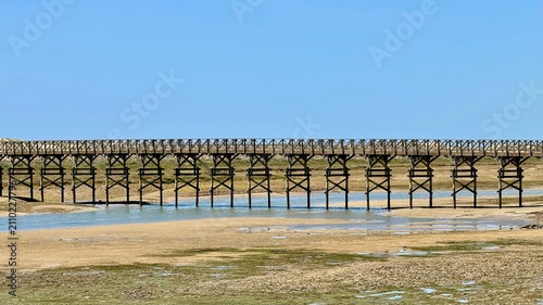 Quinta do Lago Boardwalk across sand dunes in Ria Formosa Natural Park, Algarve, Portugal