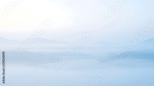 Highly minimalist tranquil blue mountain layers fading gently into thick soft mist