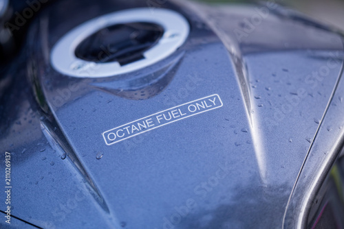 Bild auf Leinwand Closeup of a motorcycle fuel tank with an octane fuel only sticker