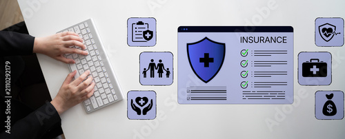 Принти на полотні Professional hands typing on keyboard with insurance document interface and various healthcare icons on modern desk, health coverage concept in digital format