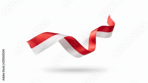 Waving red and white satin ribbon isolated on white background for Indonesian independence day design element