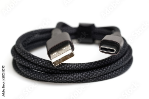 Black braided usb-a to usb-c cable on white background