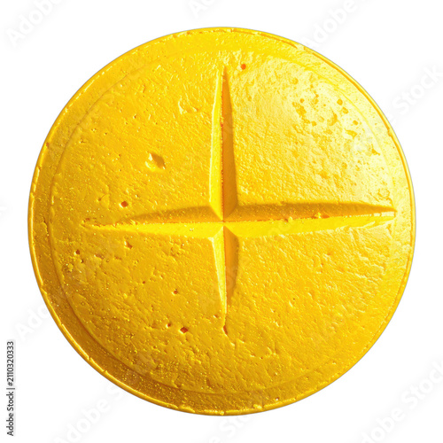 A bright yellow circular object with a cross-like indentation.
