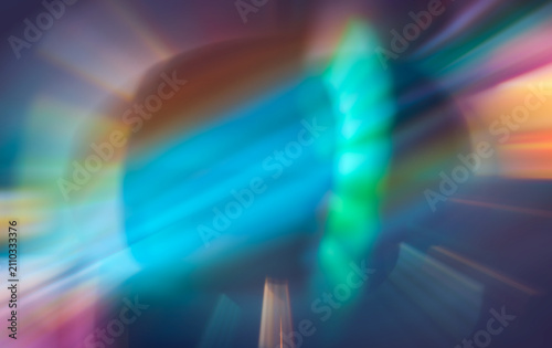 Abstract futuristic neon light leaks with lens flares on dark background.