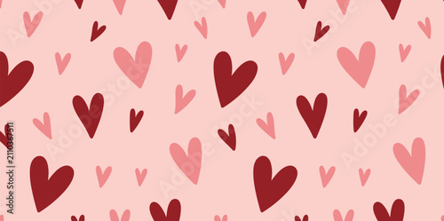 Quadro su tela Valentine's Heart Pattern: A delightful seamless pattern featuring a playful arrangement of red and pink hearts scattered across a soft pink background