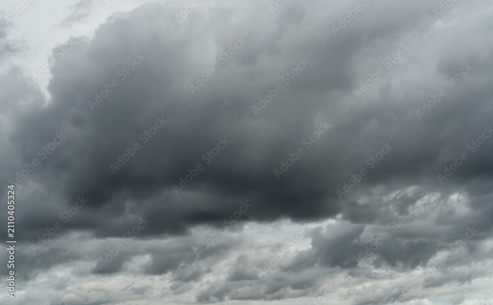 Obraz premium Overcast sky. Dramatic gray sky and white clouds before rain in rainy season. Cloudy and moody sky. Storm sky. Cloudscape. Gloomy and moody background. Overcast clouds. Halloween day background.