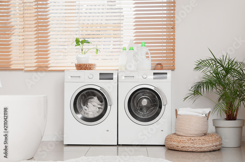 Modern laundry room interio...