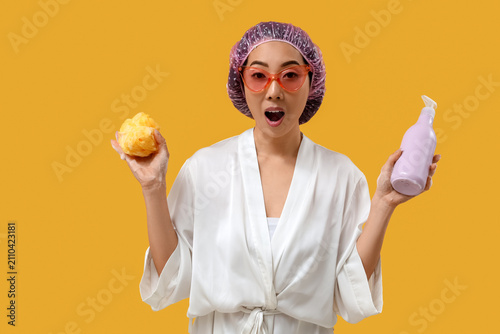 Surprised young Asian woman...