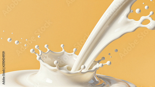 Splash of Pouring Milk on Warm Yellow Background