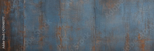 Obraz na płótnie Rusty blue metal texture with weathered paint and corrosion background