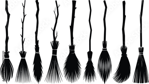 Foto Collection of various rustic wooden witch broomsticks displayed as a detailed bl