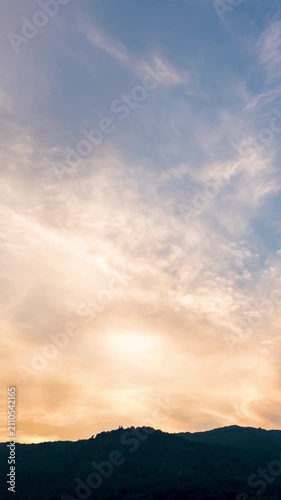 Beautiful evening clouds time-lapse, soft purple and pink sky background.