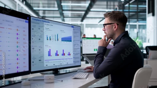 Compliance Officer Reviews Dashboard Analytics
