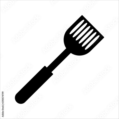 Fotografia Single slotted kitchen spatula solid icon featuring angled flipper utensil for c