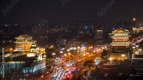 Fotografie The ancient buildings of Qianmen in Beijing, China, are brightly lit, a city night view from an aerial perspective