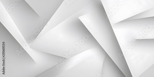 Abstract white paper folds creating geometric shadows and light.