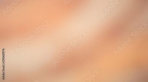 Abstract soft warm peach and beige bokeh gradient background for minimal design