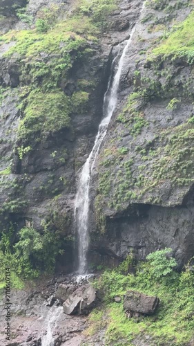 Scenic monsoon waterfall flowing through Bhimashankar Wildlife Sanctuary, Maharashtra, India in stunning 4K.