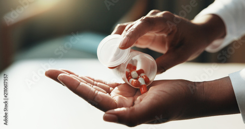 Photography Medical, healing and hand in house with pills, care plan and health treatment with medication