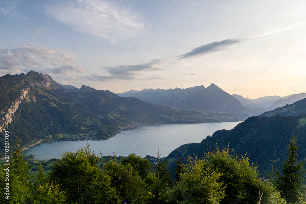 Obraz premium Sunset Over Lake Thun and Bernese Alps from Harder Ridge, Bernese Oberland, Switzerland