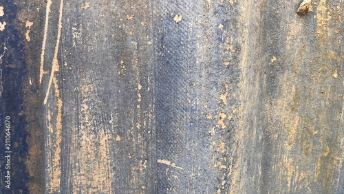 Фотография The surface of the old corrugated zinc sheet shows clear signs of use