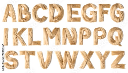 Alphabet letters formed from blonde hair against a white background. Each letter is individually crafted and textured