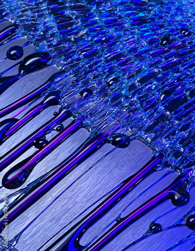 Textured Heat Sink Plate with Dripping Viscous Blue Fluid under Fractured Glass