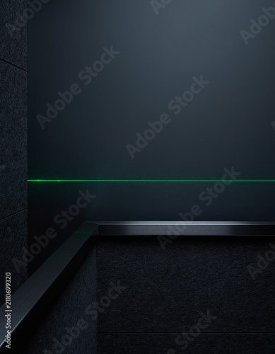 Dark Brushed Metal Trim with Thin Green Laser Line across Wall