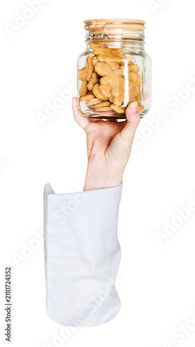 Obraz na płótnie Png cookies jar in hand, transparent background