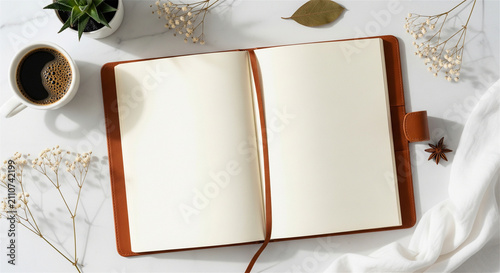 Leather journal mockup on white marble desk, blank open notebook with coffee and flowers, elegant workspace flat lay for blogging and planning