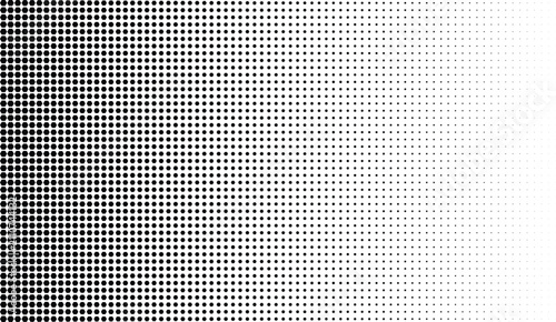 Foto Vertical halftone gradient pattern with black circles transitioning from dense o