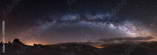 Spain, Milky way over mountains