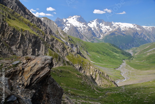 View from a hiking trail towards Valfroide Valley above La Grave village, Romanche Valley, Hautes Alpes (French Southern Alps), France, with La Meije mountain range (Ecrins National Park)