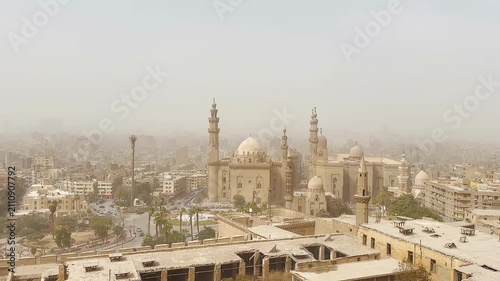 Dust storm in central Cairo. Sultan Hassan Mosque, Al-Rifai Mosque in Cairo, Egypt