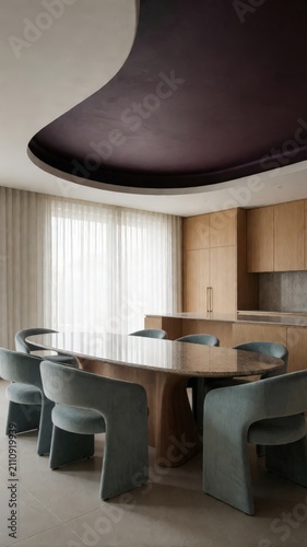 Retro dining room with oval granite table and plush chairs, oak cabinetry and dramatic ceiling Use: interior design blog, furniture catalog, home d...