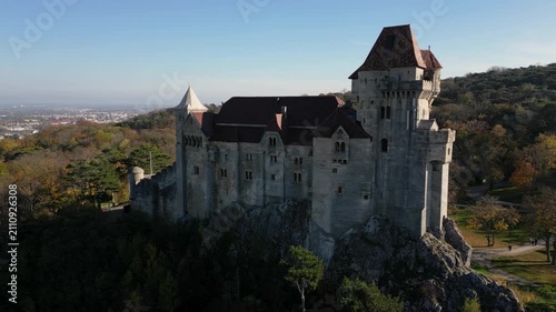 Medieval castle on top of the cliff with forest around it, Castle Liechtenstein