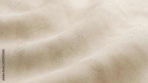Soft beige fabric texture background.