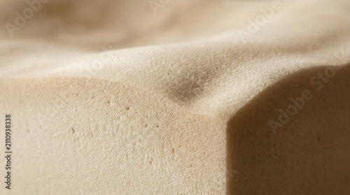 Sand dune landscape with brown object.